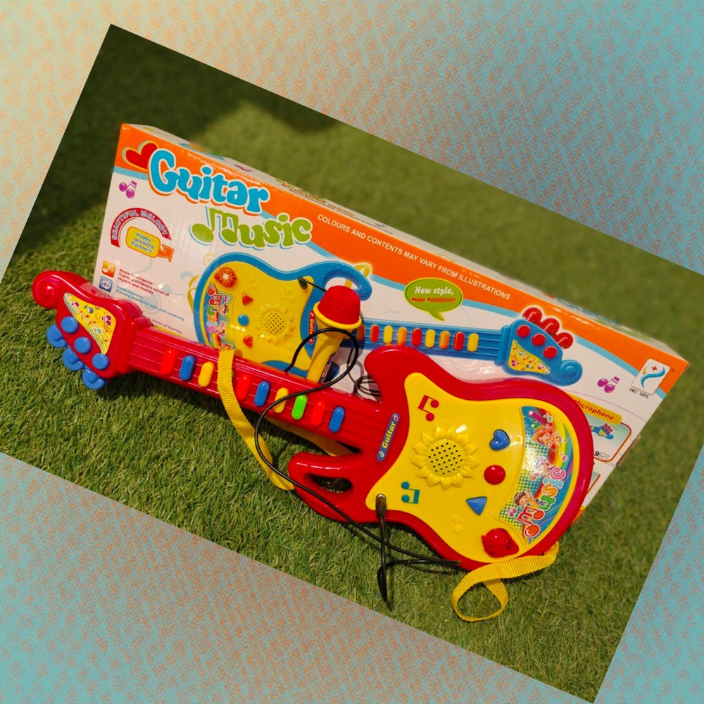 TOYS ของเล่นกีต้าร์พร้อมไมค์โครโฟน รุ่น 1334933 ขนาด 15x44.5x4 ซม.คละสี