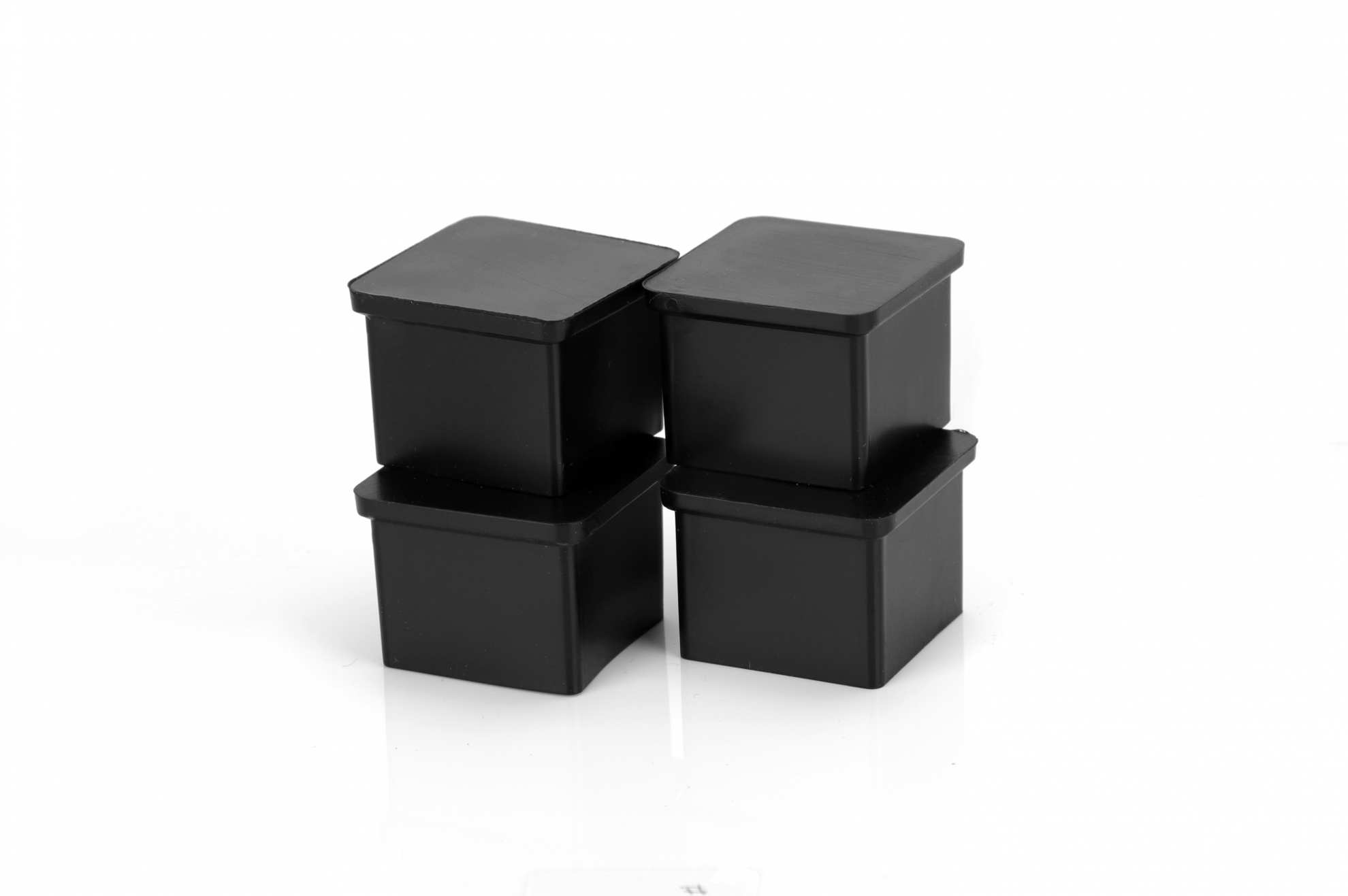TORSTEN พลาสติกรองขาโต๊ะสี่เหลี่ยม (สวมนอก) รุ่น 1XY-004-1/14 ขนาด 1-1/4” แพ็ค 4 ชิ้น สีดำ