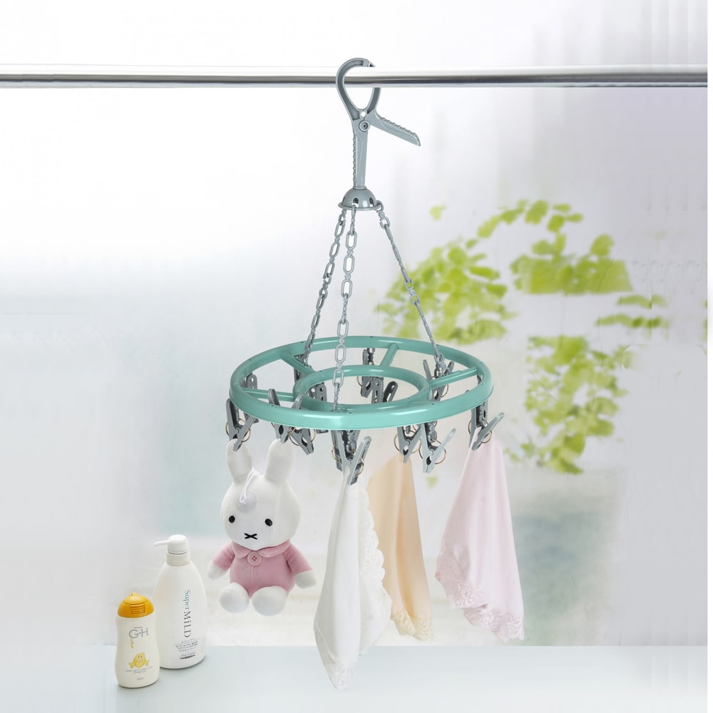 SAKU ห่วงตากผ้าพลาสติก 16 ตัวหนีบ รุ่น TG52211 ขนาด 28x28x35 ซม. คละสี